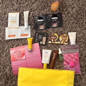 Samples , Sunscreens and a makeup bag
